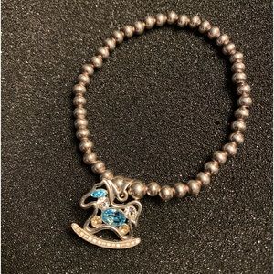 Sterling Silver stretch cord Bracelet with rhinestones Aqua Pony Toy charm Beads